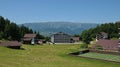 Landscape with Hotel from the Fundata Resort at Cheile Gradistei with Piatra Craiului Mountains in the background. Royalty Free Stock Photo