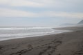 Landscape. A huge and incredibly beautiful beach with black volcanic sand