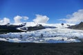 Landscape of icebergs, water and black rock at JÃÂ¶kulsarlon glacier lagoon, Iceland