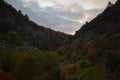 Landscape image of columnar jointing of basalt rocks and foliage in Boyabat, Sinop, Turkey, at a sunny day Royalty Free Stock Photo