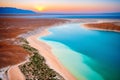 The Dead Sea has a white salt beach and mountains.