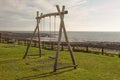 A landscape image of an empty pair of swings Royalty Free Stock Photo