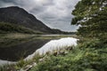 Landscape image of mountain reflected in still lake on Summer mo Royalty Free Stock Photo