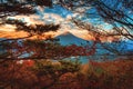 Landscape image of Mt. Fuji over Lake Kawaguchiko with autumn foliage at sunrise in Fujikawaguchiko, Japan Royalty Free Stock Photo