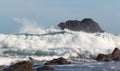 Landscape image of Ocean Waves Crashing against Coastal Rocks Royalty Free Stock Photo