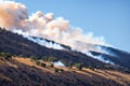 The oak tree fire is raging across the hill.