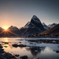 rock in the sea, back mountains and a sunset in Norway. Royalty Free Stock Photo