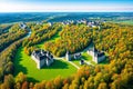 The ruined medieval Janowiec Castle can be seen in the spring landscape.