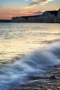Landscape image of sunset over Birling Gap in England Royalty Free Stock Photo