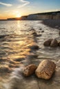 Landscape image of sunset over Birling Gap in England Royalty Free Stock Photo