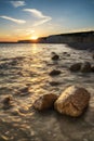 Landscape image of sunset over Birling Gap in England Royalty Free Stock Photo