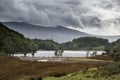 Landscape image of view from Precipice Walk in Snowdonia overlooking Barmouth and Coed-y-Brenin forest during rainy afternoon in Royalty Free Stock Photo