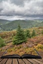 Landscape image of view from Precipice Walk in Snowdonia overlooking Barmouth and Coed-y-Brenin forest coming out of pages in Royalty Free Stock Photo