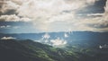 Landscape images of white mist floating above the complex mountains