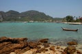 A landscape of the island the beach and small hill with boat Royalty Free Stock Photo