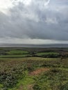 Landscape of Isle of Wight, UK with lush fields against stormy clouds Royalty Free Stock Photo