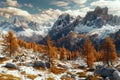 Landscape of the Italian Alps in autumn with brown larch trees and snowcapped mountains,