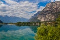 Landscape of an Italian village on the shore of lake Como against the background of the Alps