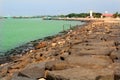 Landscape of karaikal beach with stone way and light house. Royalty Free Stock Photo