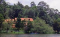 A landscape of the kodaikanal lake with houses. Royalty Free Stock Photo