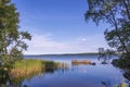 Landscape with lake and blue sky. Quiet Monrepos park in Vyborg, Russia