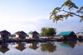 Landscape lake with cottage house village. relaxation waterfront hut Royalty Free Stock Photo