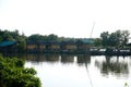 Landscape lake with cottage house village. relaxation waterfront hut Royalty Free Stock Photo