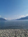 landscape of lake geneva and the dents du midi withfog on the lake Royalty Free Stock Photo