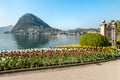 Landscape with Lake Lugano and colorful tulips in bloom from Ciani Park in springtime. Royalty Free Stock Photo