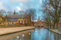 Landscape at Lake Minnewater and church in Bruges