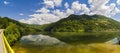 Lake and misty forest in mountains in a rainy day Royalty Free Stock Photo