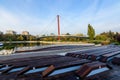 Landscape with the lake and suspended bridge from Drumul Taberei Park, also known as Moghioros Park, in Bucharest, Romania, at