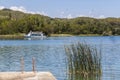 Landscape in lake and touristic ship in Banyoles,Catalonia,Spain.