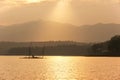 Landscape of lake and traditional raft dip net at sunset