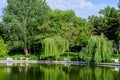 Lake and vivid green trees in Drumul Taberei Park (Parcul Drumul Taberei) also known as Moghioros Park, in