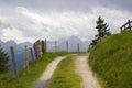 Landscape of Lienz Dolomites in Austria. Road and panorama of massive Alpine mountains