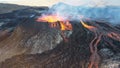 Landscape of lightening erupting from Mauna Loa Volcano in Hawaii with smoke and a hazy sky