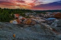 Landscape like a planet Mars surface. Ural refractory clay quarries. Nature of Ural mountains, Russia. Solidified red