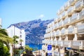 Residential apartments in the background of Los Gigantes Cliffs, Tenerife, Spain