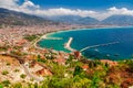 Landscape with marina and Kizil Kule tower in Alanya peninsula, Antalya district, Turkey, Asia. Famous tourist destination with Royalty Free Stock Photo