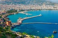 Landscape with marina and Kizil Kule tower in Alanya peninsula, Antalya district, Turkey, Asia. Famous tourist destination with Royalty Free Stock Photo