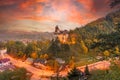 Landscape with medieval Bran castle at sunset Royalty Free Stock Photo