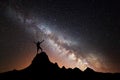 Landscape with Milky Way and silhouette of a happy man Royalty Free Stock Photo