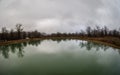 Landscape with misty morning fog in the Forest Lake or Beautiful forest lake in the morning at winter time. Azerbaijan nature. Royalty Free Stock Photo