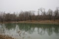 Landscape with misty morning fog in the Forest Lake or Beautiful forest lake in the morning at winter time. Azerbaijan nature. Royalty Free Stock Photo