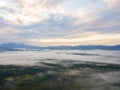 Landscape of misty mountain forest covered hills at khao khai nu