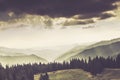 Landscape of misty mountain in forests hills. Royalty Free Stock Photo