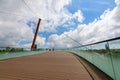 Landscape with the modern metallic, wooden and glass bridge in Drumul Taberei Park Parcul Drumul Taberei also known as Moghioros