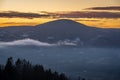 Winter sunset in Moravian-Silesian Beskids in Czech Republic, view of the Ostry peak with elevation of 1045 meters Royalty Free Stock Photo