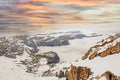 Landscape of morning colorful sky with snow cladded Alps mountains,